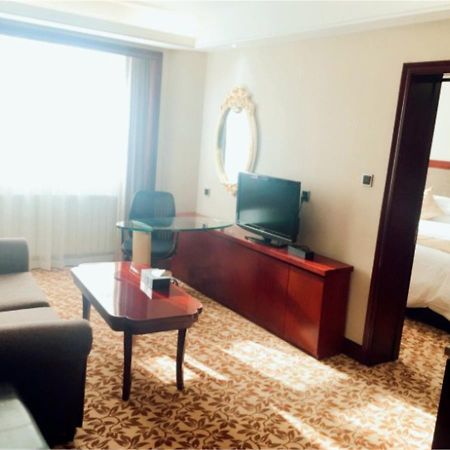 New Paris Hotel Harbin Exterior foto