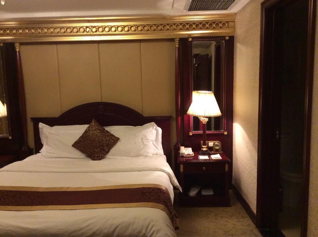 New Paris Hotel Harbin Habitación foto